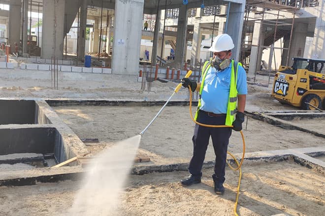 Anti-termite treatment being carried out on a Dubai construction site