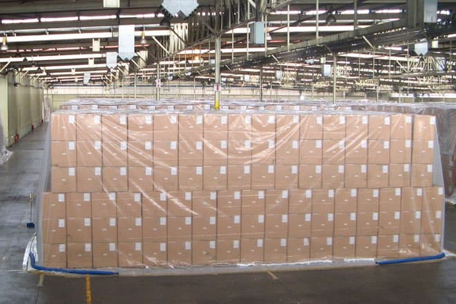 Baled tobacco in storage prior to fumigation treatment